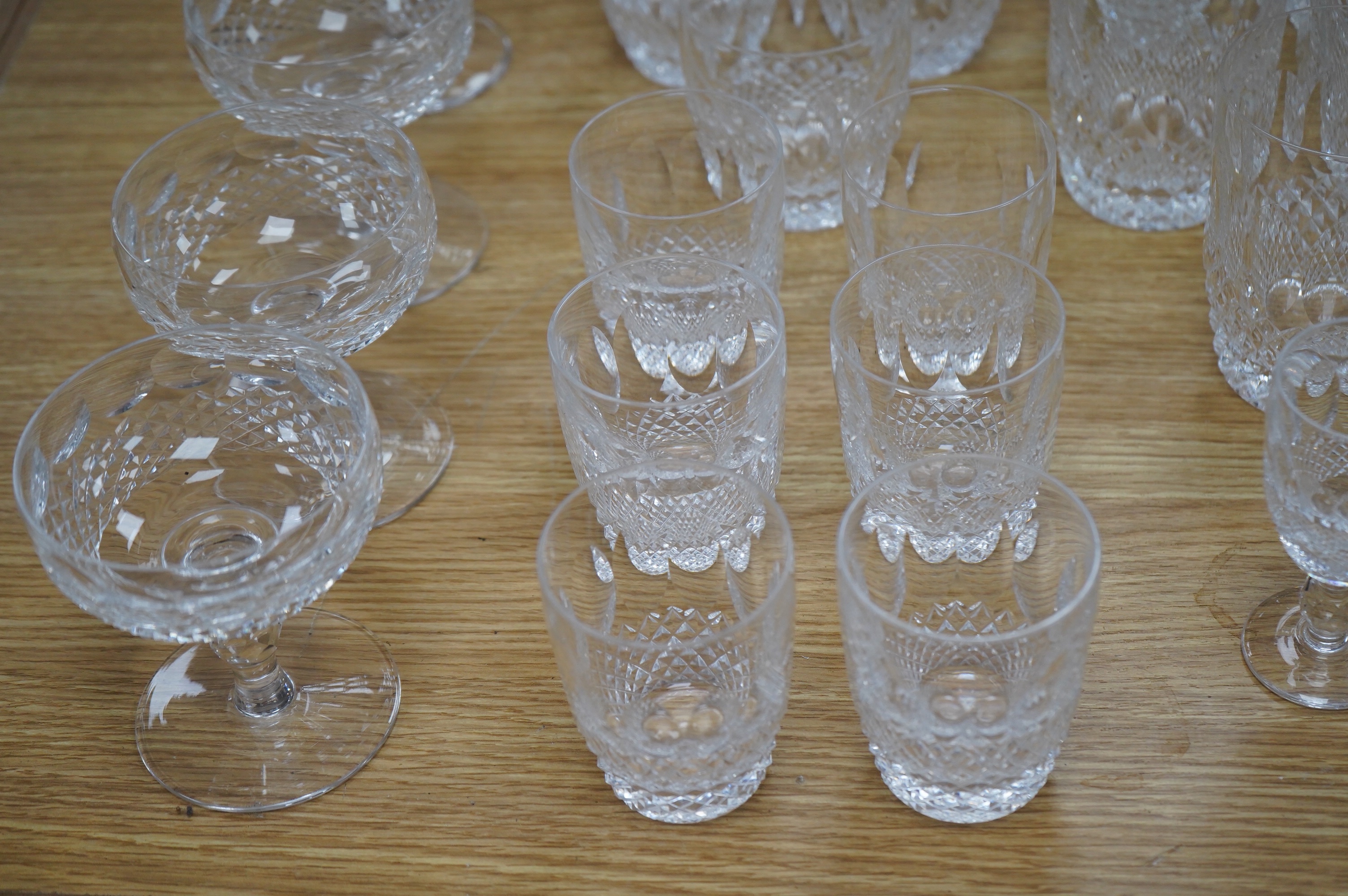A Waterford Colleen pattern part suite of table glass including decanter, jug and glasses, largest 26cm high. Condition - mostly good